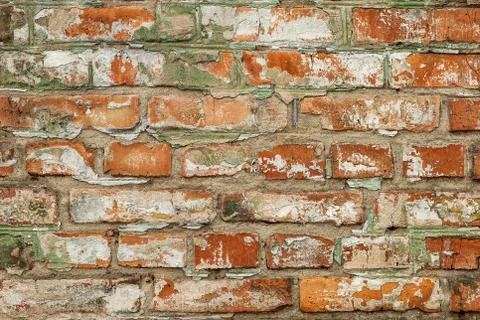 Old red brick wall, rustic texture, design background. Stock Photos