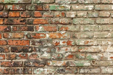 Old red brick wall, rustic texture, design background. Stock Photos