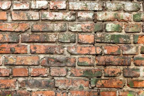 Old red brick wall, rustic texture, design background. Stock Photos