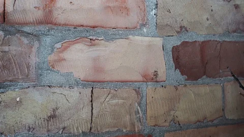 Old red brick wall as texture background. Old brick building. Stockbeeldmateriaal 128599043