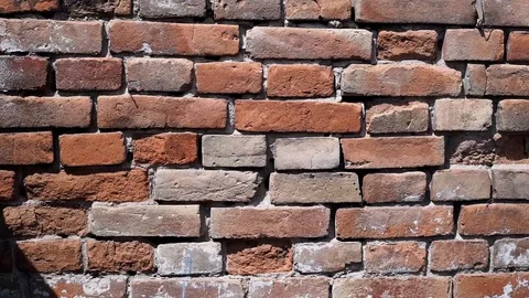 Old red brick wall as texture background. Old brick building. Stock Footage 128599183