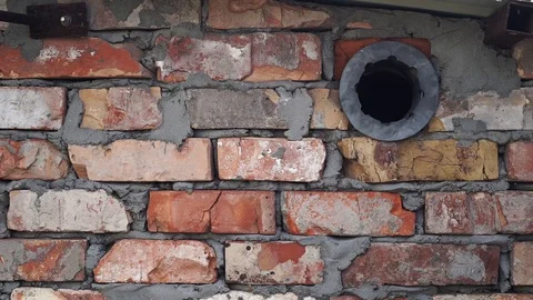 Old red brick wall as texture background. Beautiful brick background Stock Footage 128599401