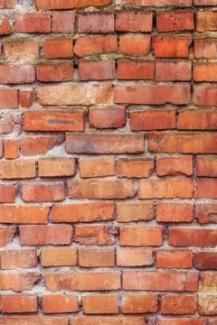 Old red brick wall texture, vertical background Stock Photos