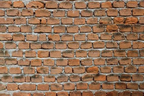 Old red brick wall texture. Background of a old brick house. 写真素材