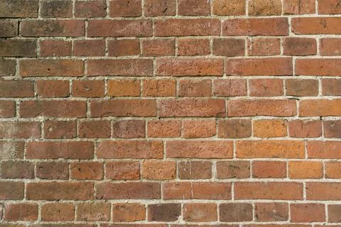 Old red brick wall texture. Background of a old brick house. Stock Photos