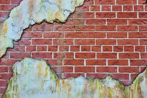 Old red brick wall texture with patches of white aging plaster Stock Photos