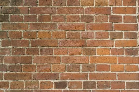 Old red brick wall texture. Background of a old brick house. Stock Photos