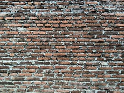 Old red brick wall texture background with vintage look and cement joints 스톡 사진