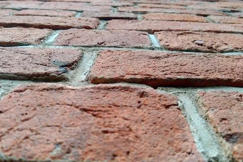 An old red brick wall, view from below, restoration and restoration of buildi Stock Photos