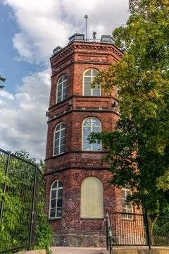 An old red bricks tower in a park of Helsinki - 1 Stock Photos