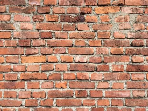 Old red bricks wall background Foto stock