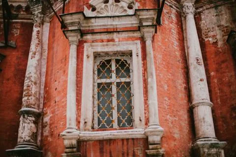 The old red building with window Stock Photos