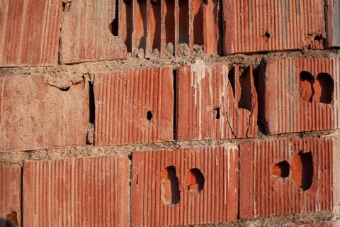 Old red ceramic bricks close up. Keramoblock. Red brick wall texture backgrou Stock Photos