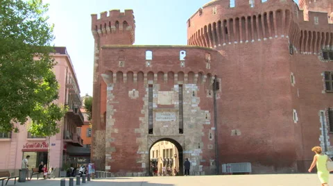 Old red city gate in square Catalonia france Stock Footage 50542687