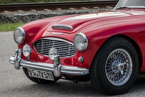 Old red classic car front view on a show Stock Photos