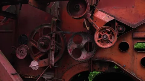 Old red combine harvester pulleys for moving Видео 335206982