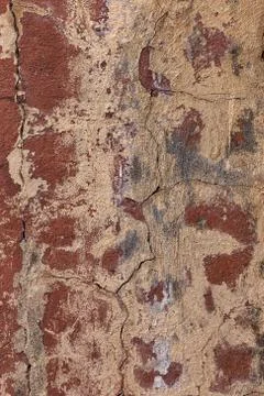 Old red cracked wall, rustic texture, design background. Stock Photos