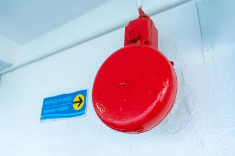 Old red fire bell on the wall. Fire safety Stock Photos