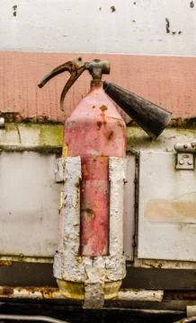 Old Red fire extinguishers available in fire emergencies / Fire extinguisher  Foto stock