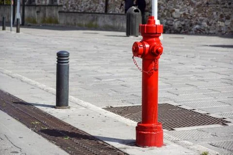 Old red fire hydrant in New York City street. Fire hidrant for emergency fire Stock Photos