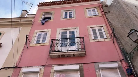 Old red house of Alfama, view of Lisbon and old town, Portugal Stock Footage 249486877