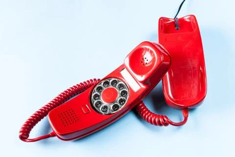 Old red phone off the hook Stock Photos