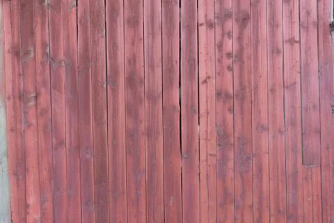 Old red plankd barn wall Stock Photos
