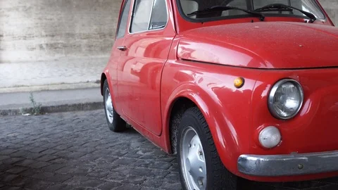 Old, red, small car in Rome. Italy. 4k Vídeo Stock 99403031