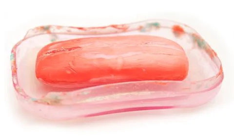 Old red soap on a white background Stock Photos