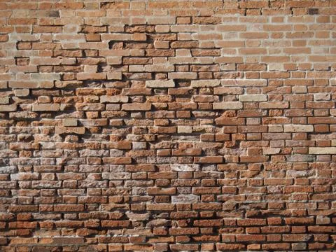 Old red stone wall Stock Photos