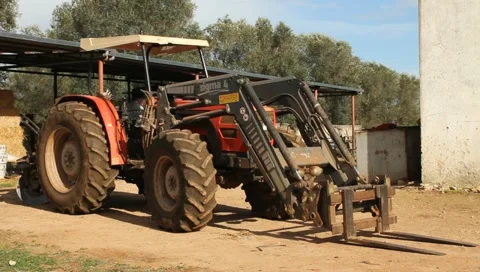 An old red tractor Stock Footage 10900859