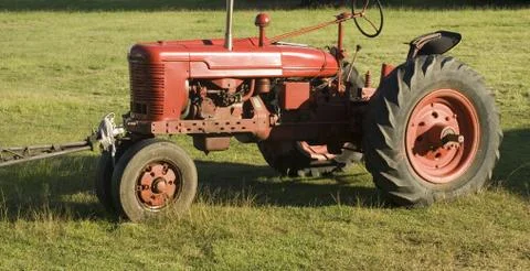Old red tractor Stock Photos