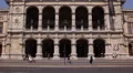 Old Red Tram Passing Crossing Front Facade Vienna State Opera Busy Cars Traffic HD Footage