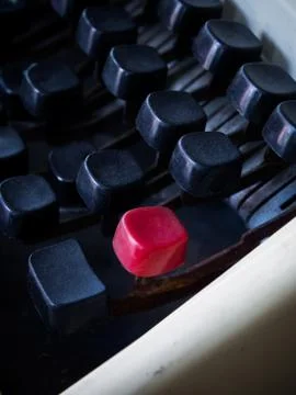 Old red typewriter button Stock Photos