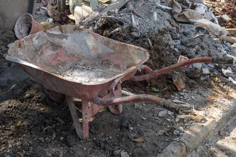 Old red wheelbarrow Stock Photos