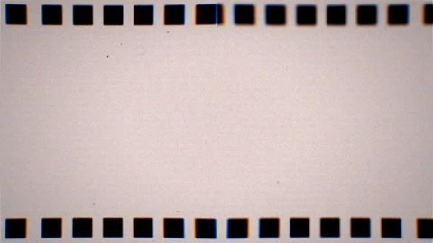 Old reel negative seamless loop with dirt, noise, scratches, grain and dust. Stock Footage 117634094