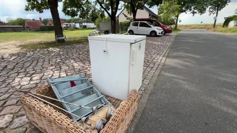 Old Refrigerator and Household Items Left for Sperrmüll Stock Footage 339657482