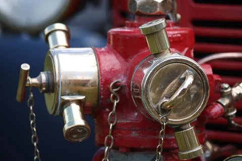 Old restored fire hydrant with brass parts Stock Photos