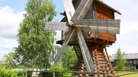 Old restored windmill on the river bank Stock Footage 68691187