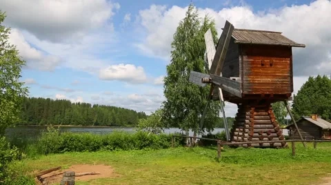 Old restored windmill on the Svir River bank Stock Footage 68691194