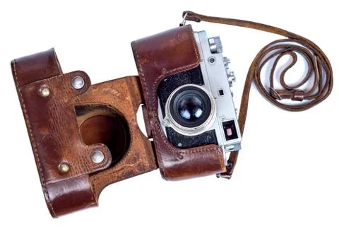 Old retro camera in a leather case on a white background Stock Photos