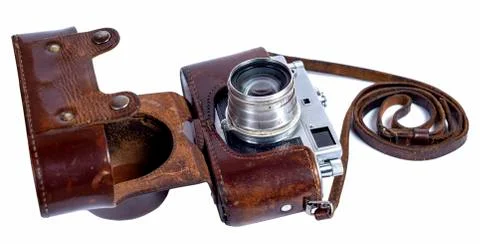 Old retro camera in a leather case on a white background Stock Photos