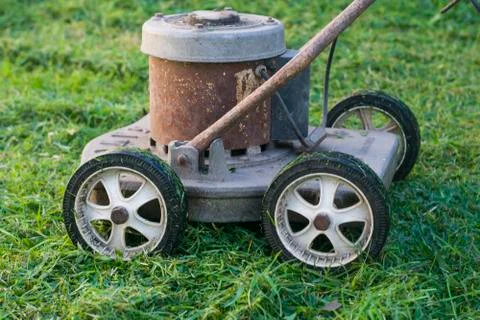 A old retro grass cutting machine Stock Photos