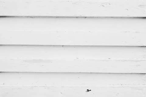 Old retro peeled white colored wood plank in vertical pattern Stock Photos