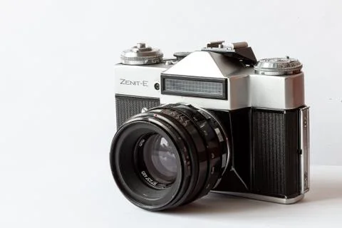 Old retro Soviet Zenith Zenit E camera with exposure meter on a white isolate Stock Photos