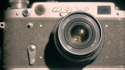 Old retro style lens camera in the dark light studio indoor Stock Footage 64854789