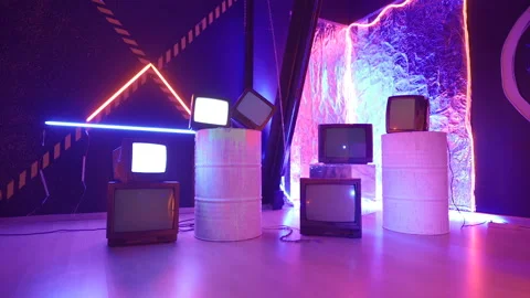 Old retro televisions with Cathode-ray tube screen on barrel or floor. TV Video stock 146199742