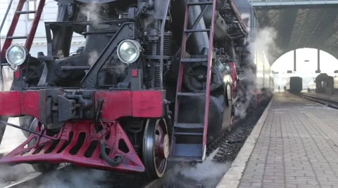 Old Retro Train Stops at the Station Stock Footage 62344928