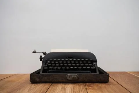 Old retro typewriter on table Stock Photos