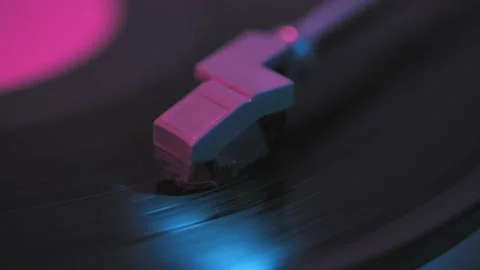 Old retro vinyl record, neon light. Stock Footage 149679364